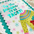 Upclose of handmade greeting card with a sweater on it and 'tis the season to be tacky sentiment on it. Upclose of handmade greeting card with a sweater on it and 'tis the season to be tacky sentiment on it.