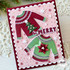 Handmade greeting card with two sweaters on it with be merry sentiments on it.