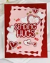 Handmade greeting card with hearts and keys on it with sending hugs sentiment on it.