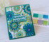 Handmade greeting card with paper fans on it and have a fantastic brithday sentiment on it with crafting materials in background.