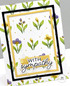 Handmade greeting card with flowers on it and with sympathy sentiment on it.