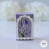 Small handmade gift box with flower on it with purple enamel dots on it.