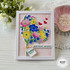 Handmade greeting card with bouquet of flowers on it and birthday wishes sentiment and sending hugs sentiment on it.
