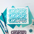 Handmade greeting card with congrats on your amazing news sentiments on it with papercrafting materials in the background.