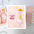Handmade greeting card with a drink cup, citrus fruit, and sip back and relax sentiment on it with cards in the background.