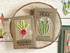 Two handmade mini greeting cards, one with a radish on it and the label radish and sunshine seed co. sentiment and the other with peas on it and the label peas with just add sunshine sentiment on it.