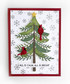 Handmade greeting card with tree on it with ornaments and two cardinals on it and all is calm, all is bright sentiment on it.