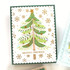 Handmade greeting card with tree on it with ornaments and season's greetings sentiment on it.