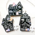 Three handmade greeting tags that are of different haunted houses.