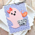 Handmade greeting card with a ghost on it holding a pumpkin basket and call me cute and feed me candy sentiment on it.