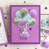 Handmade greeting card with balloons holding a present up with happy birthday sentiment on it. Handmade greeting card with balloons holding a present up with happy birthday sentiment on it.
