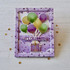 Handmade greeting card with balloons holding a present up with let's celebrate sentiment on it. Handmade greeting card with balloons holding a present up with let's celebrate sentiment on it.