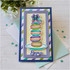 Handmade greeting card with macarons on it with bonjour sentiment on it.