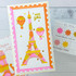 Handmade greeting card with Eiffel tower on it with balloons and miss you sentiment on it.
