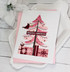 Handmade greeting card with Christmas tree on it and season's greetings sentiment on it.