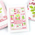 Handmade greeting card with Christmas postage on it and season's greetings sentiment on it.