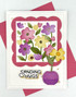 Handmade greeting card with flowers on it and sending hugs sentiment on it.