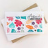 Handmade greeting card with leaves on it and autumn greetings sentiment on it.