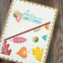 Handmade greeting card with leaves on it and autumn greetings sentiments on it.