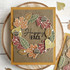 Handmade greeting card with wreath of leaves on it and happy fall sentiment on it.