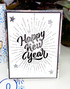 Handmade greeting card with fireworks on it and happy new year sentiment on it.