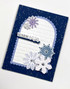 Handmade greeting card with snowflakes on it and warm wishes sentiment on it.