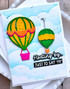 Handmade greeting card with two hot air balloons on it and floating by just to say hi sentiment on it.