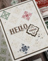 Handmade greeting card with tiles on it and hello sentiment on it.