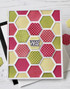 Handmade greeting card with hexagons on it and sending hugs sentiment on it.