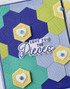 Handmade greeting card with hexagons on it and love you to pieces sentiment on it.