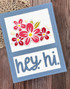 Handmade greeting card with flowers on it and hey, hi sentiments on it.