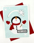 Handmade greeting card with a snowman on it and snowflakes with warm wishes sentiment on it.