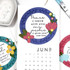 Three handmade calendars with bible verses inside a leaf wreath.