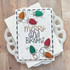 Handmade greeting card with light bulbs on it and merry and bright sentiment on it.