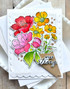 Handmade greeting card with flowers on it and flowers on it with stay strong sentiment on it.