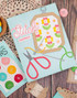 Handmade greeting card with embroidery on it and stitch happens sentiment on it.