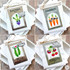 Four handmade greeting cards with various vegetables on each and different sentiments on each.