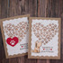 Two handmade greeting cards with hearts on it and pawprints with different sentiments on it.