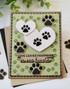 Handmade greeting card with pawprints on it and love leaves pawprints on our hearts sentiment on it.