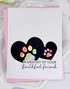 Handmade greeting card with paw prints on it and hearts with in memory of a faithful friend sentiment on it.
