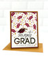 Handmade greeting card with congrats grad sentiment on it.