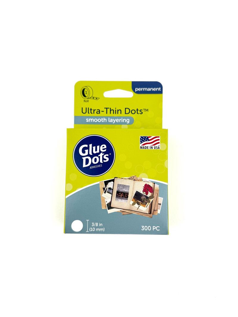 Image of Glue Dots - Utra-Thin Dot Roll used for layering in papercrafting.