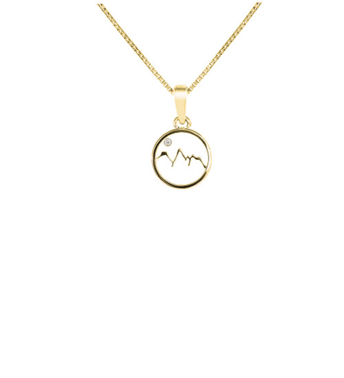 This handmade circle Grand Teton Mountain Range outline necklace in 14k yellow gold features a .01k diamond moon and is from the locally made Teton Jewelry Collection. Exclusively made for and sold at A Touch of Class.