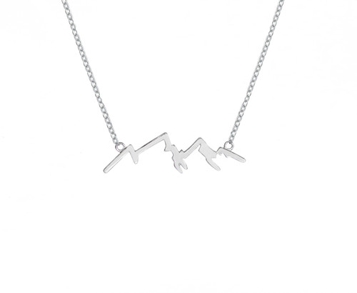 This handmade mountain silhouette 925 silver necklace with a rhodium brushed plate is from the locally made Teton Jewelry Collection.