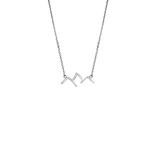 This handmade Grand Teton Mountain Range outline necklace in s14k white gold with a 1mm 18" cable chain is from the locally made Teton Jewelry Collection. Exclusively made for and sold at A Touch of Class.
