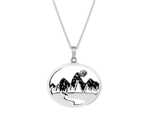 This handmade sterling silver Grand Teton Mountain Range Pendant with the chain featuring a 2.5mm Crystal is from the locally made Teton Jewelry Collection.