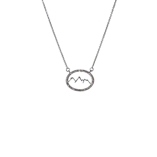 These handmade oval Grand Teton Mountain Range outline pendant necklace in 14k white gold are from the locally made Teton Jewelry Collection. Featuring 34 diamonds. Exclusively made for and sold at A Touch of Class.