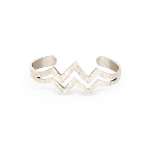 This handmade hammered sterling silver double cuff Teton bracelet is from the locally made Teton Jewelry Collection. Exclusively made for and sold at A Touch of Class.