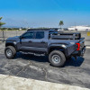 Westin/HDX 2024+ Toyota Tacoma Double Cab Xtreme Nerf Step Bars - Textured Black - 56-22785 Photo - lifestyle view