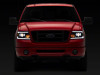 Raxiom 04-08 Ford F-150 Axial Series Projector Headlights with LED Bar- Black Housing- Clear Lens - T566363 Photo - Close Up